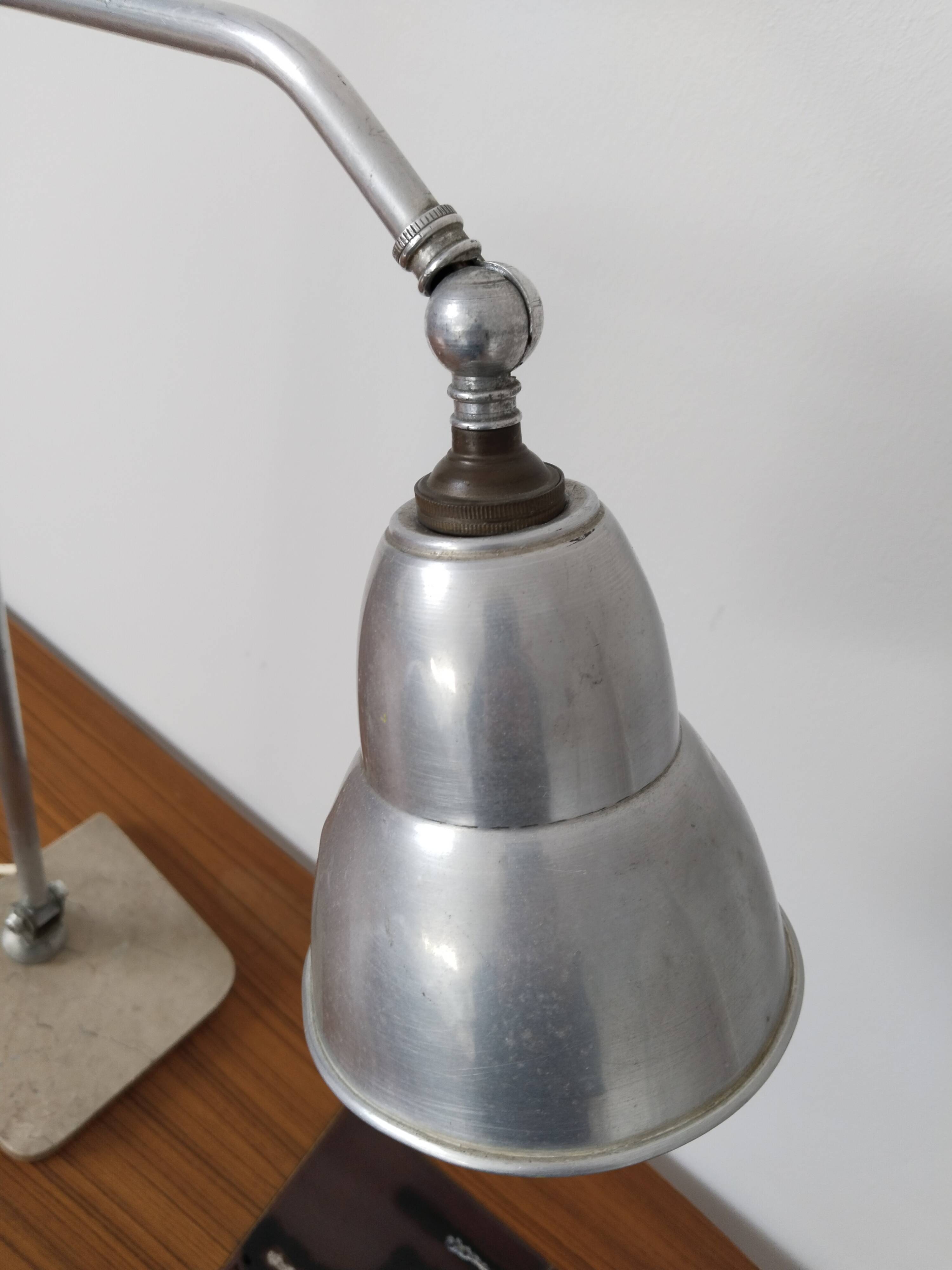 Articulated desk lamp, in aluminum and marble