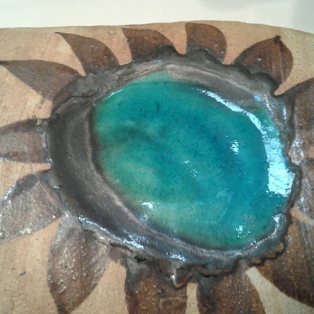 Bottle vase. ceramic enamelled with a flower. Mid-20th. Ht 21.5 cm