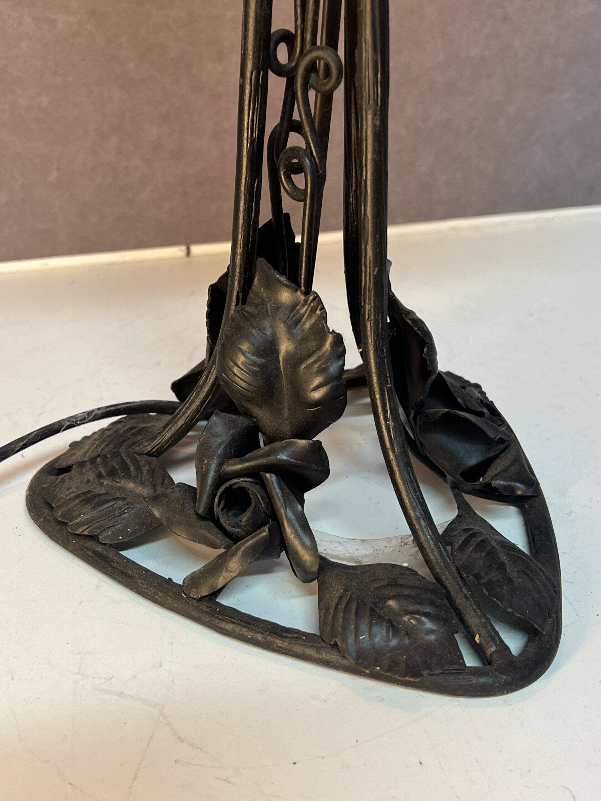 Contemporary mushroom lamp, wrought iron base and orange glass shell with blue hues in the art deco style