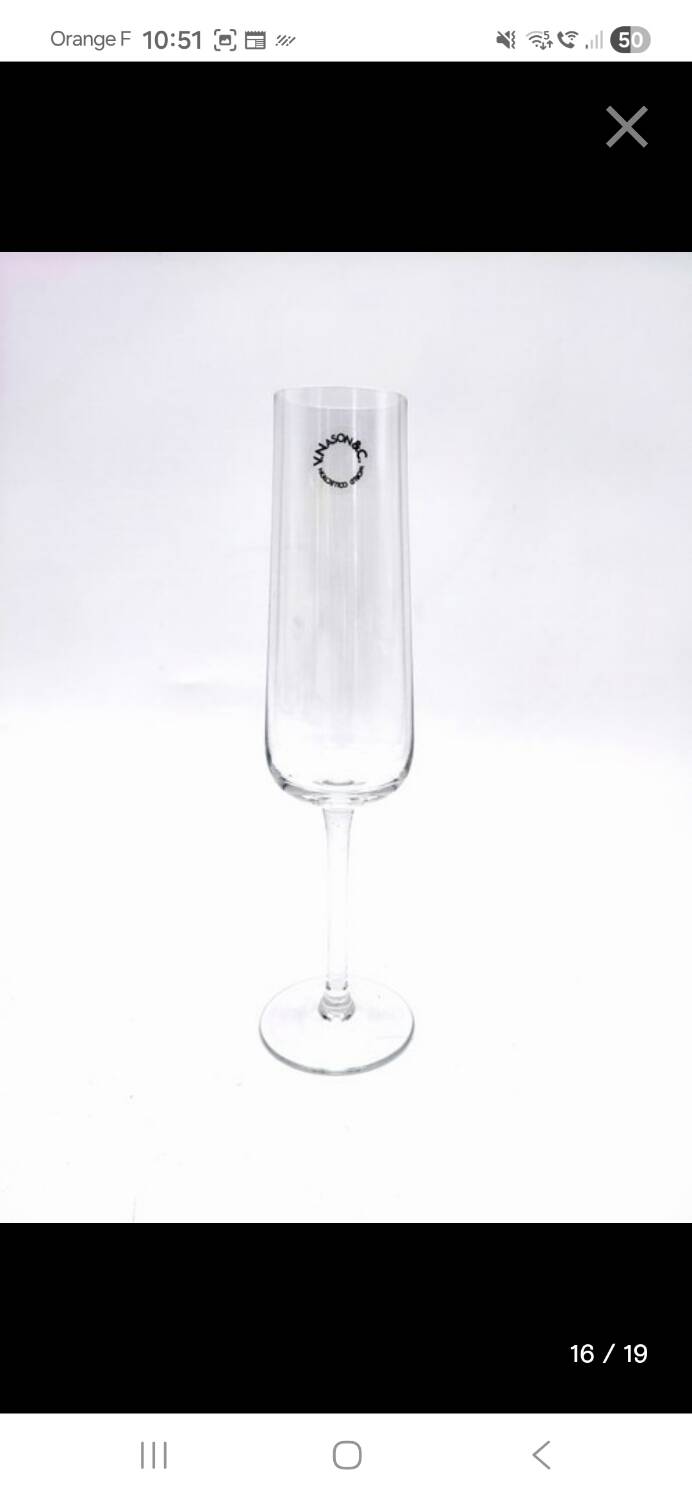 Carafe and 6 stemmed glasses made of Murano glass.