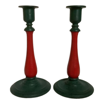 Pair of cast iron and wood candle holders