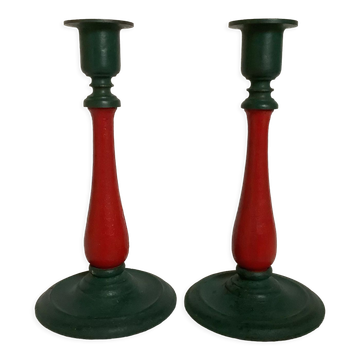 Pair of candlesticks in cast iron and wood