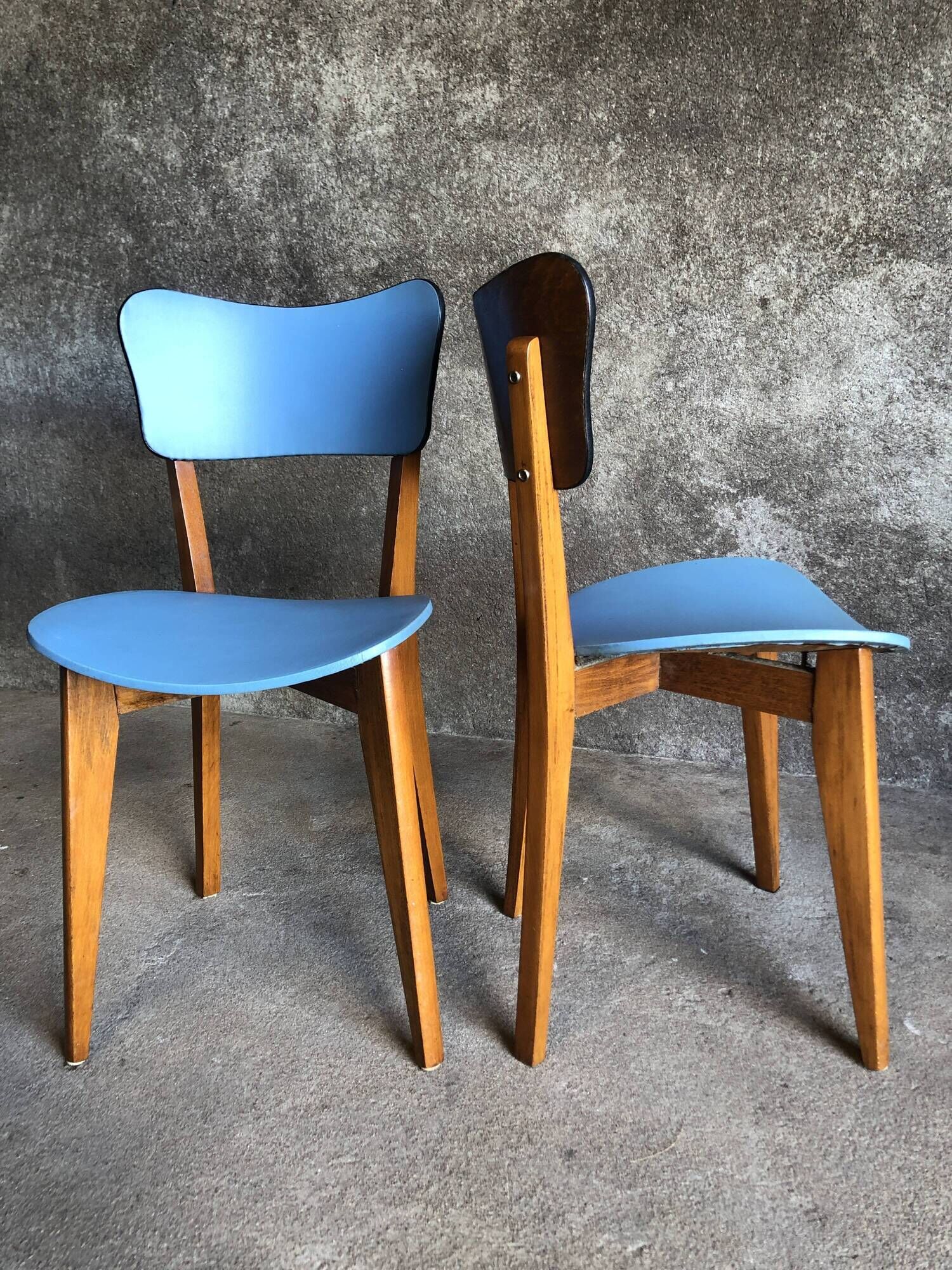 Pair of vintage bistro chairs in wood and light blue vinyl