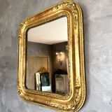 Antique gilded Louis-Philippe mirror, 19th century.