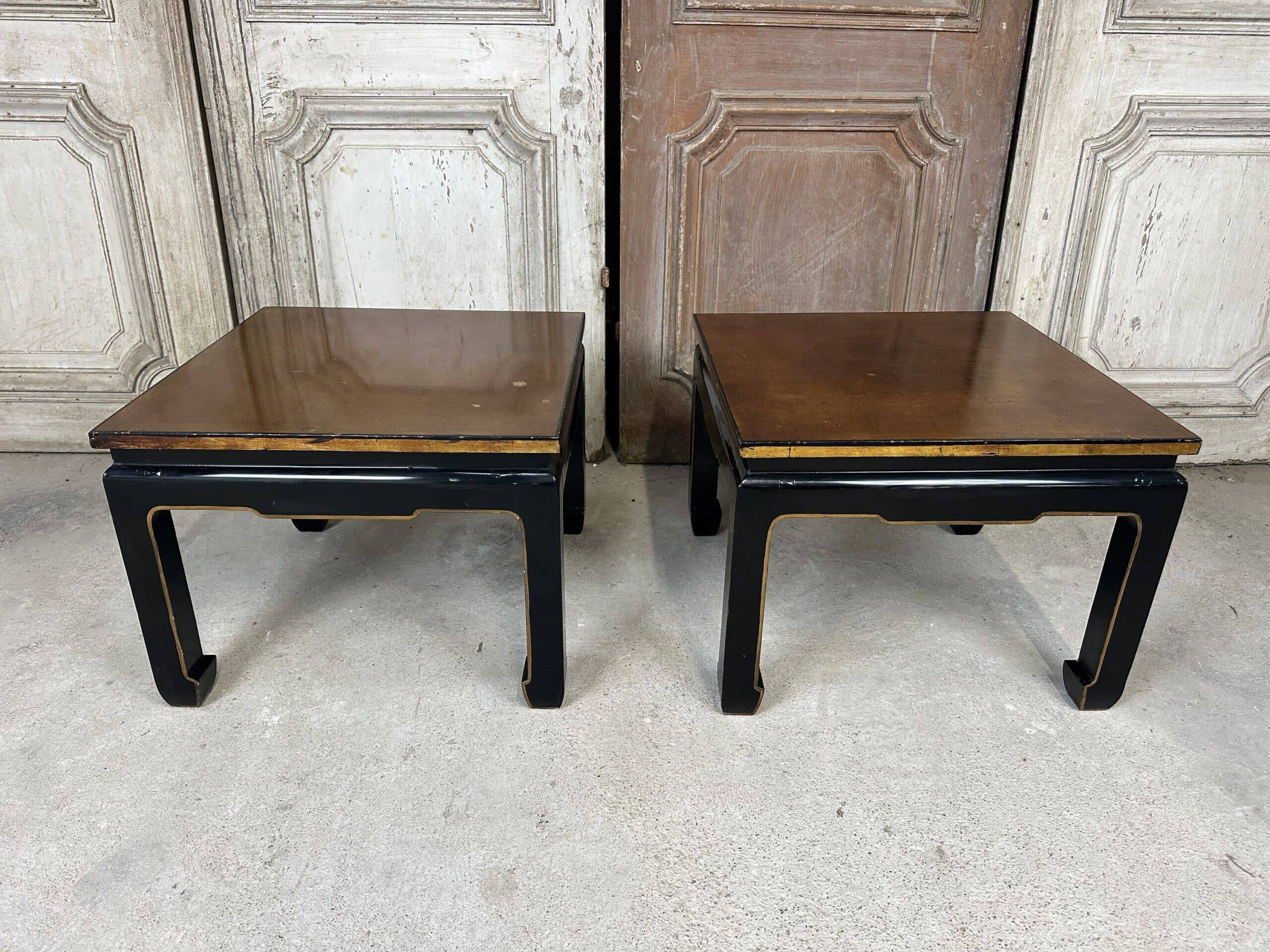 Pair of side tables in black and gold lacquer