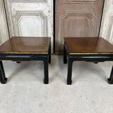 Pair of side tables in black and gold lacquer
