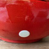 Red ceramic salad bowl with white polka dots