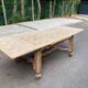 Table à manger extensible Louis XIII décapée en chêne années 50