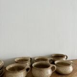 6 stoneware cups and saucers