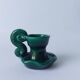 Green ceramic candlestick holder
