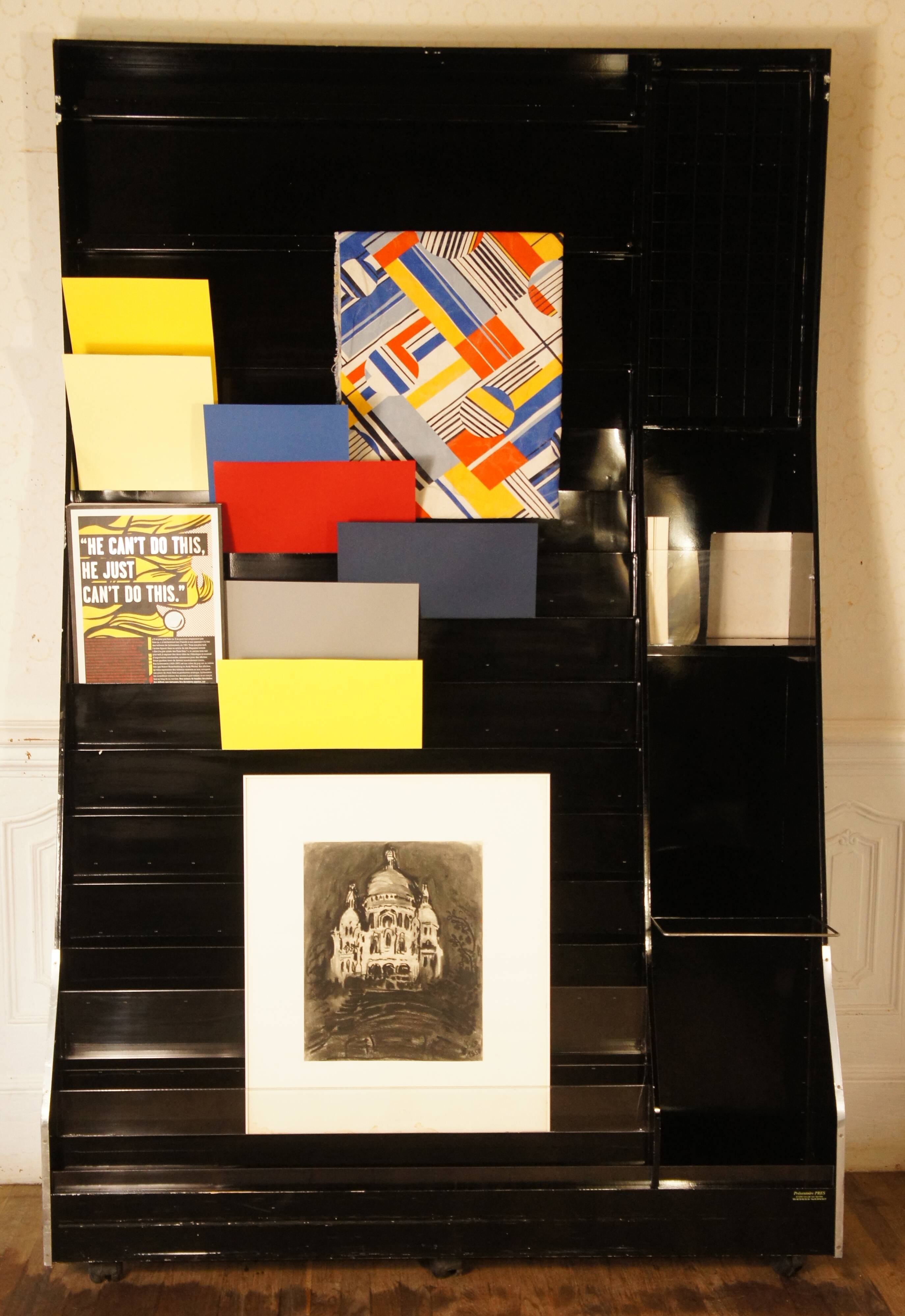 Display for store postcards on wheels, circa 1980