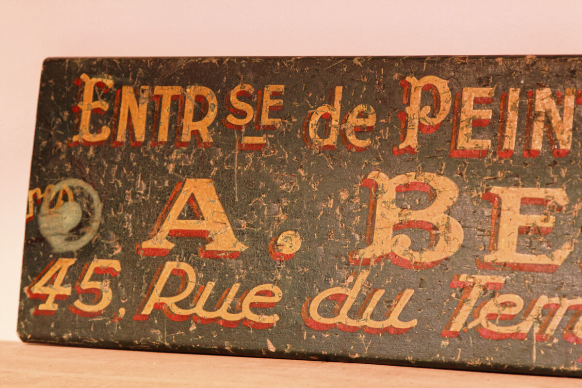Former wooden sign, Paris store