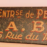 Former wooden sign, Paris store