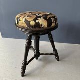 Small black round-cushionstool