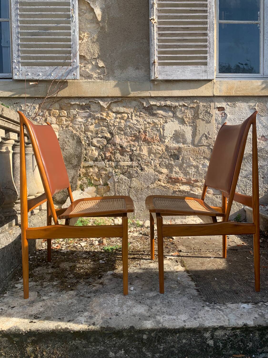 Two rare FJ49 Egyptian Finn Juhl chairs