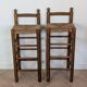 High wooden and straw stools