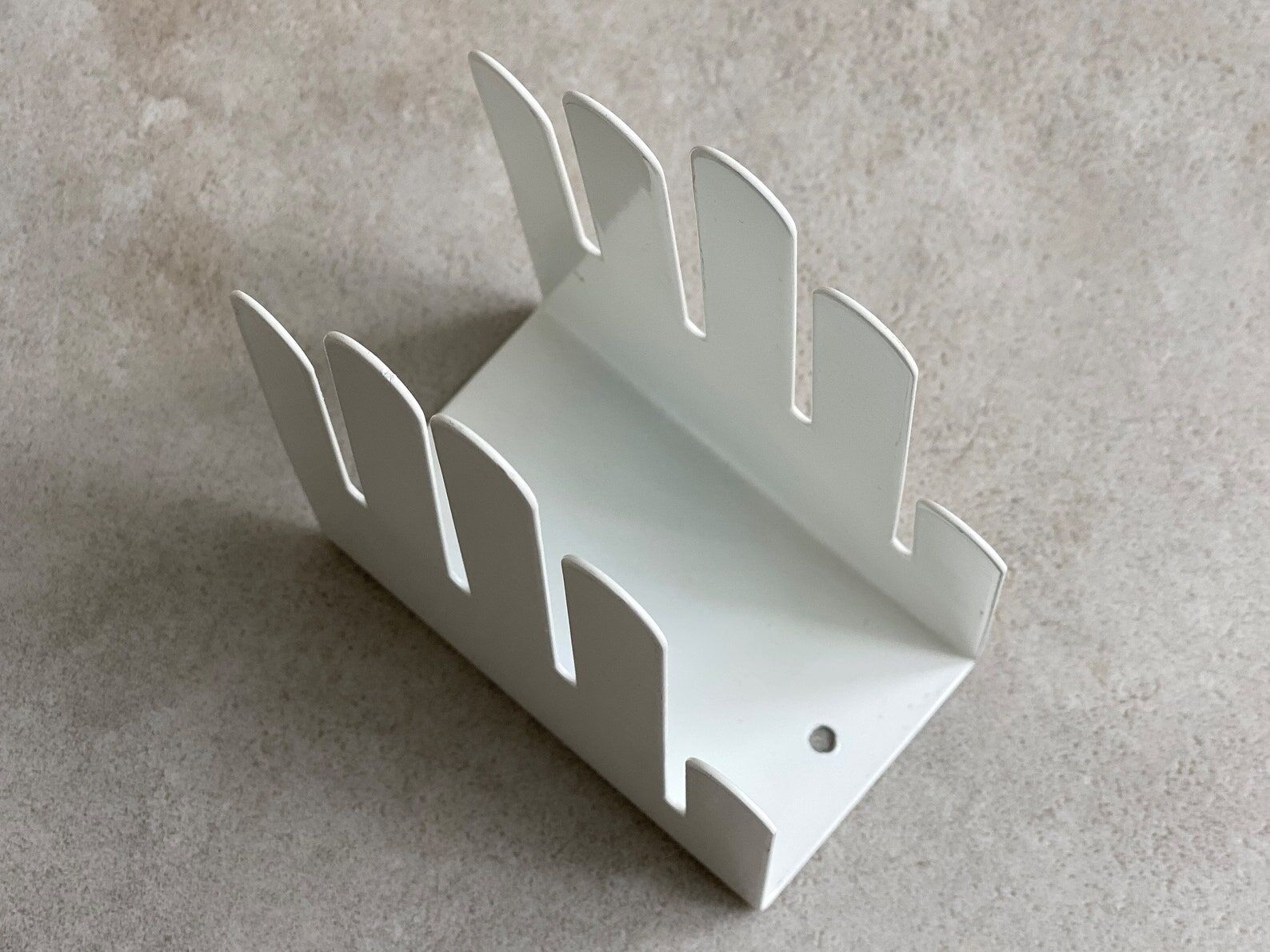 Vintage white metal hand letter holder