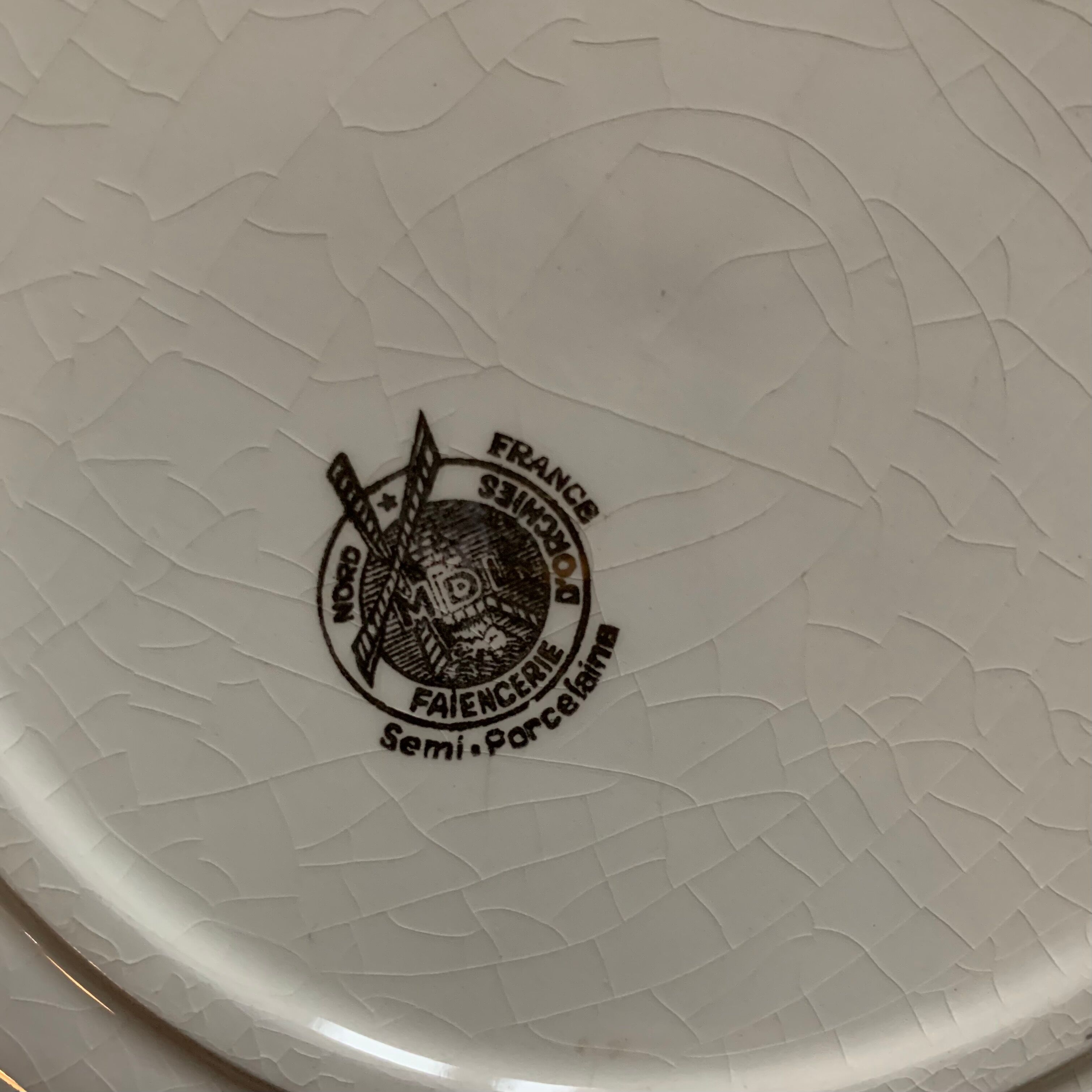 Lot of 10 hollow plates Mill of The Wolves semi-porcelain