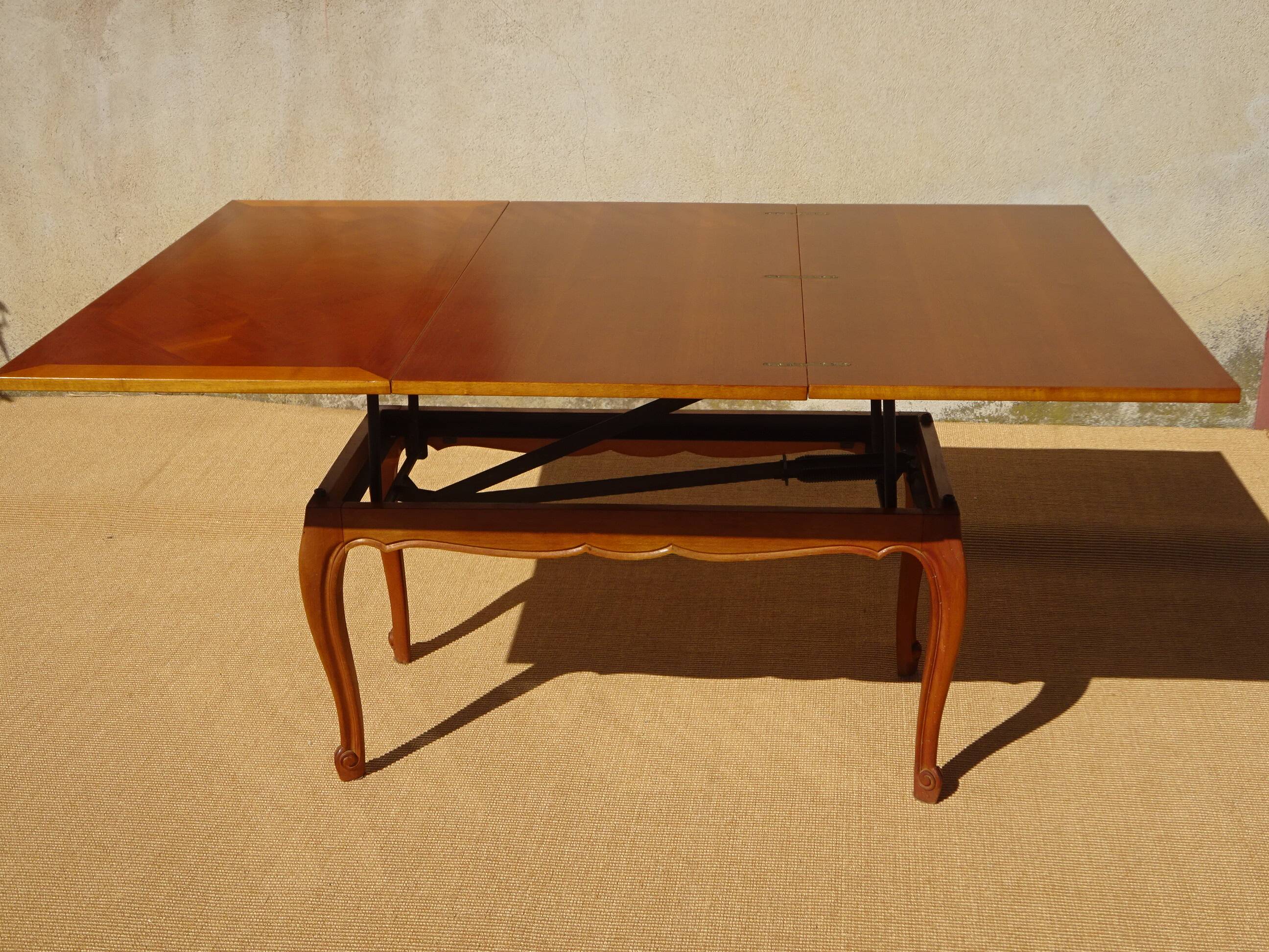 Coffee table that can be converted into a dining table, inspired by A.Ducrot