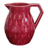 Small pitcher in old red earthenware