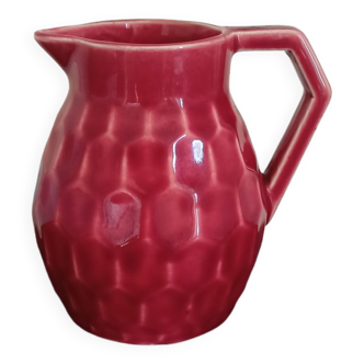 Small pitcher in old red earthenware