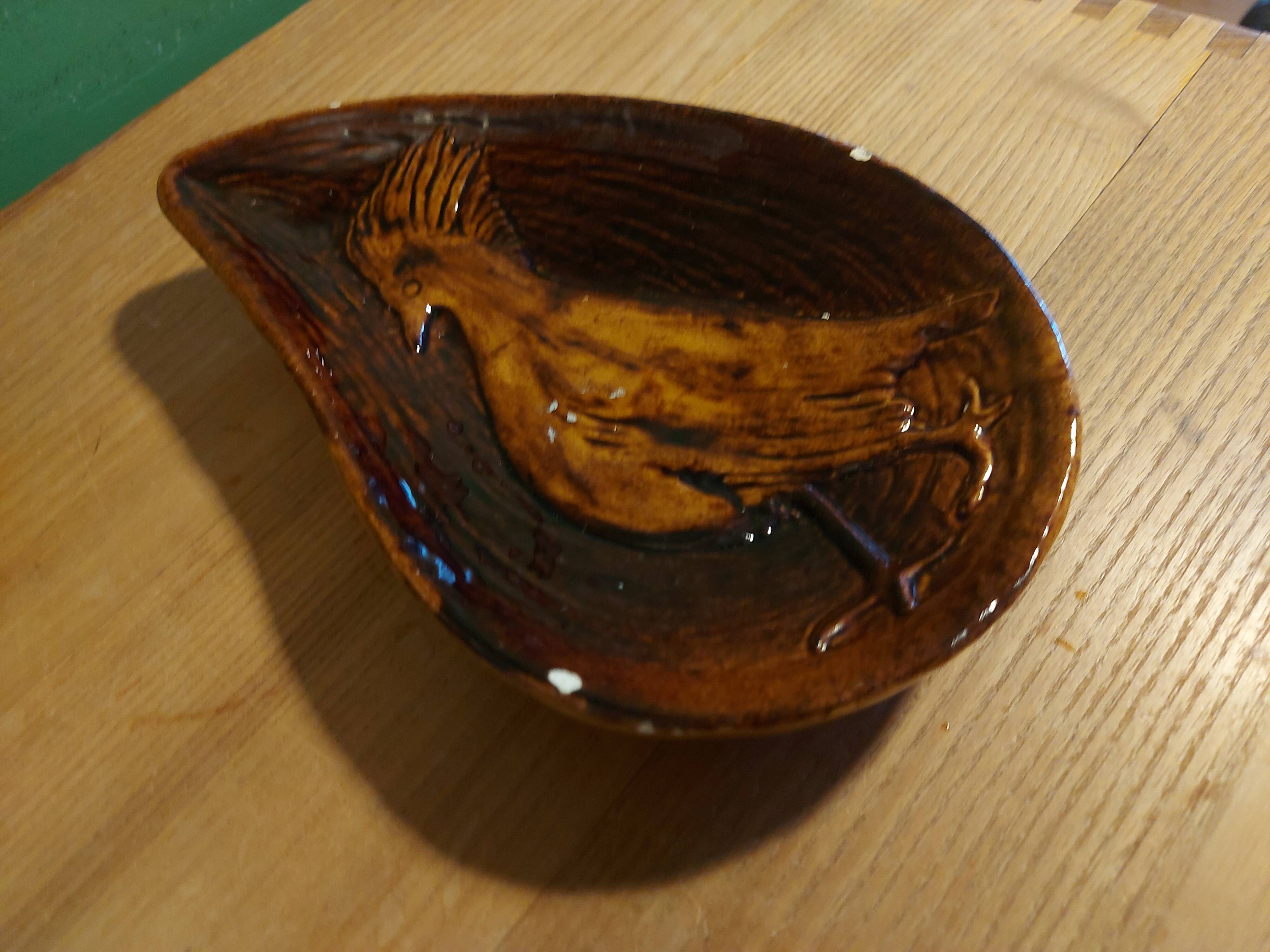 Empty pocket with vallauris bird decoration