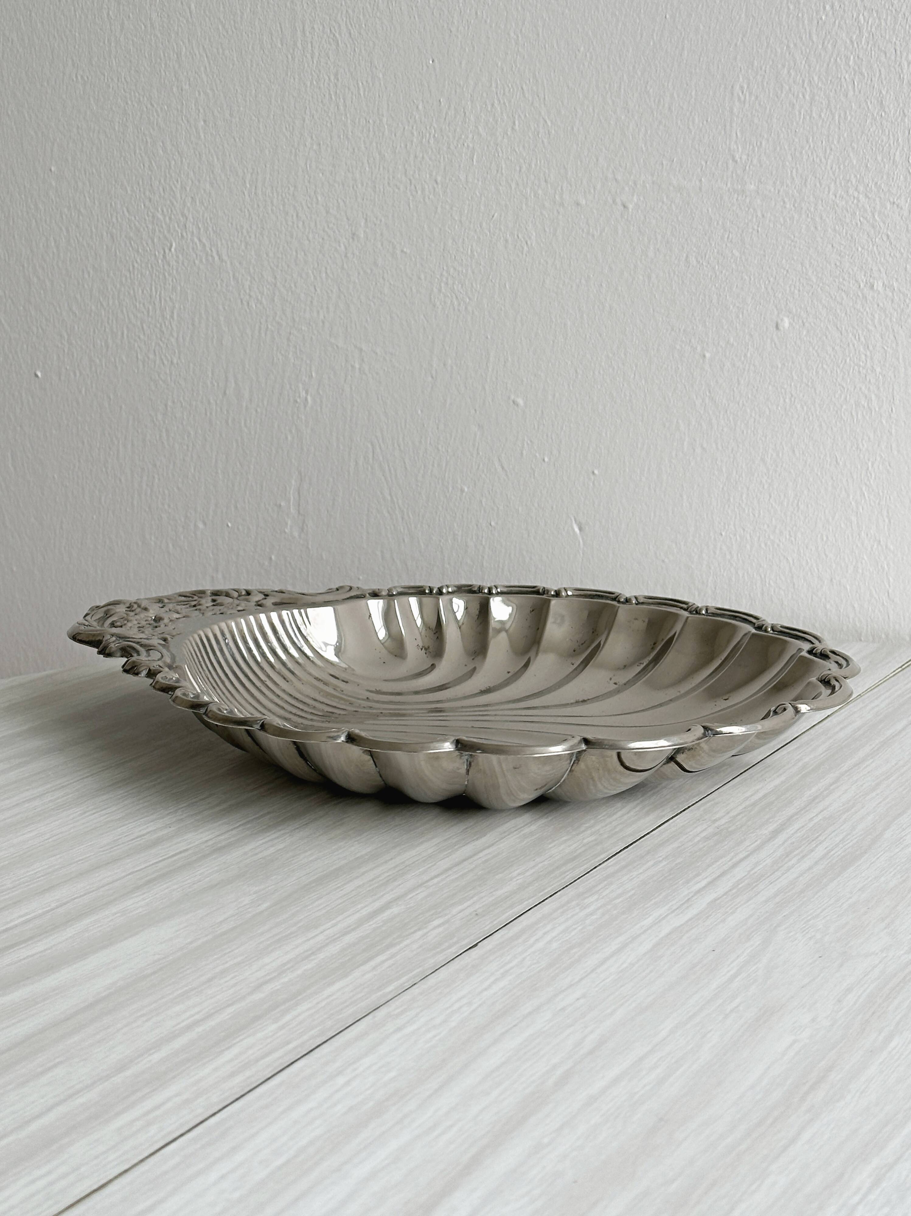 Large metal shell bowl