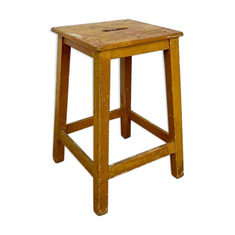 Old slotted milking stool