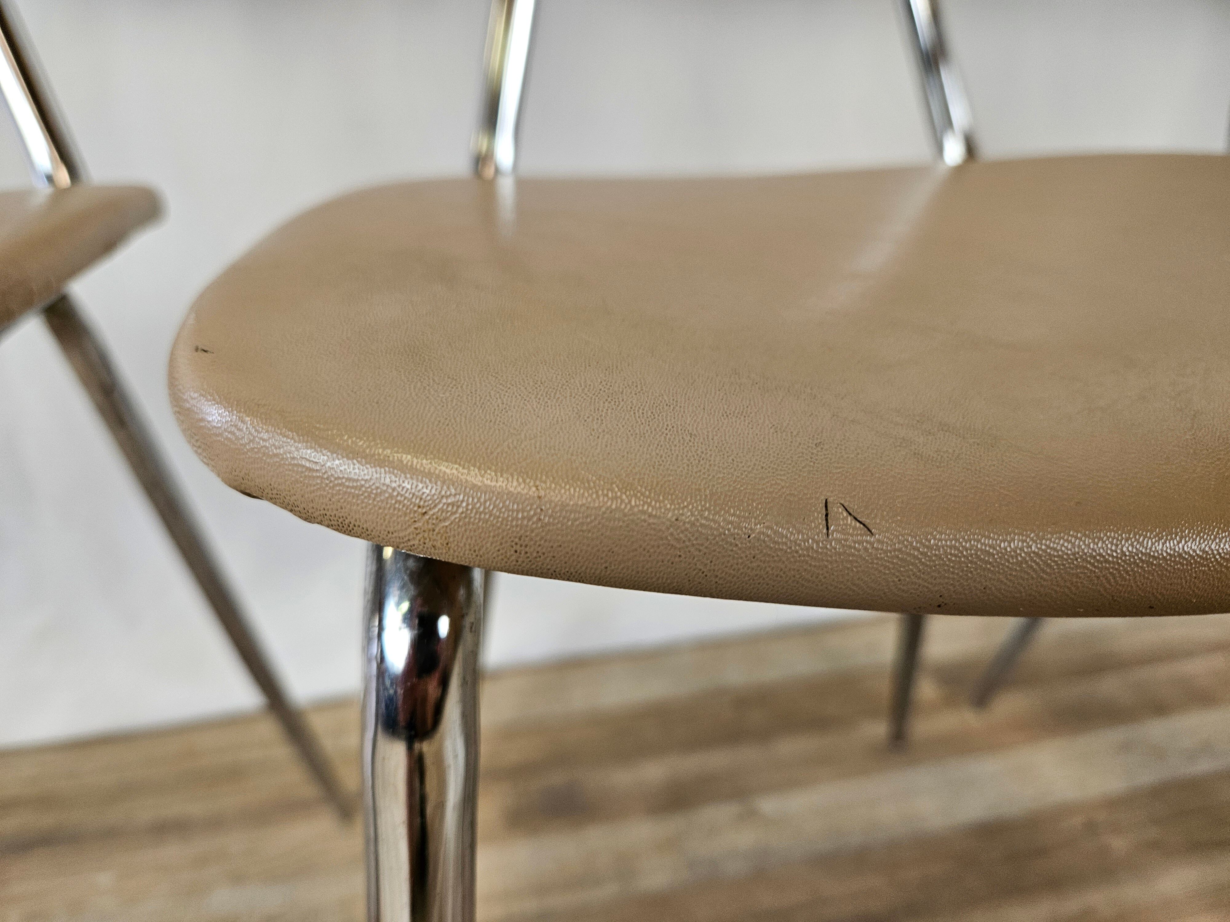 Set of four chairs in iron and skai 1970