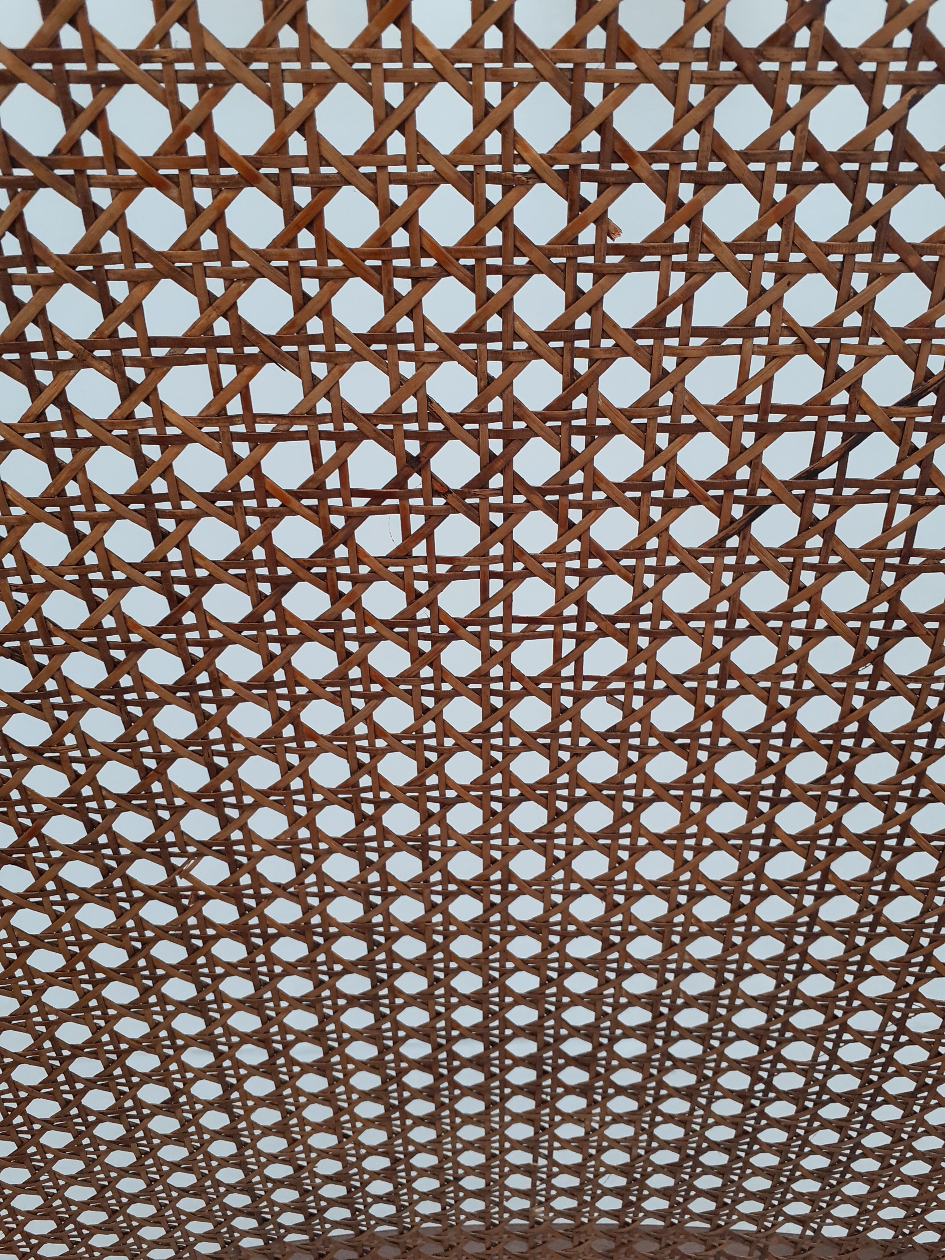 Colonial wooden armchair and cannage