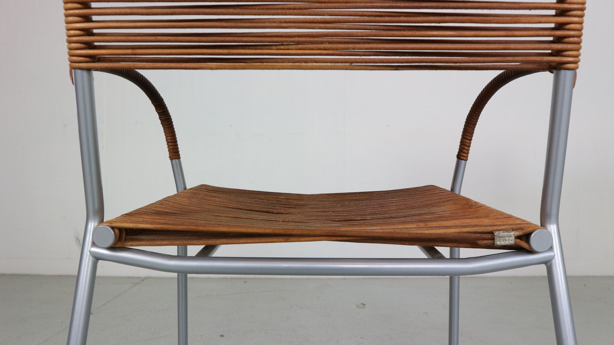 Set of 2 leather Mis B2 RVS armchairs by Tito Agnoli  for Pierantonio Bonacina