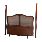 Wooden bed with canna bottom