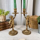 Pair of bronze “Cherubim” candlesticks