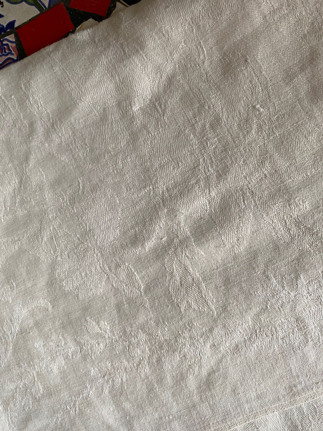 Large white cotton tea towel with damask thread.