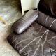 Fauteuil en cuir marron