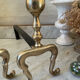 Old pair of brass andirons