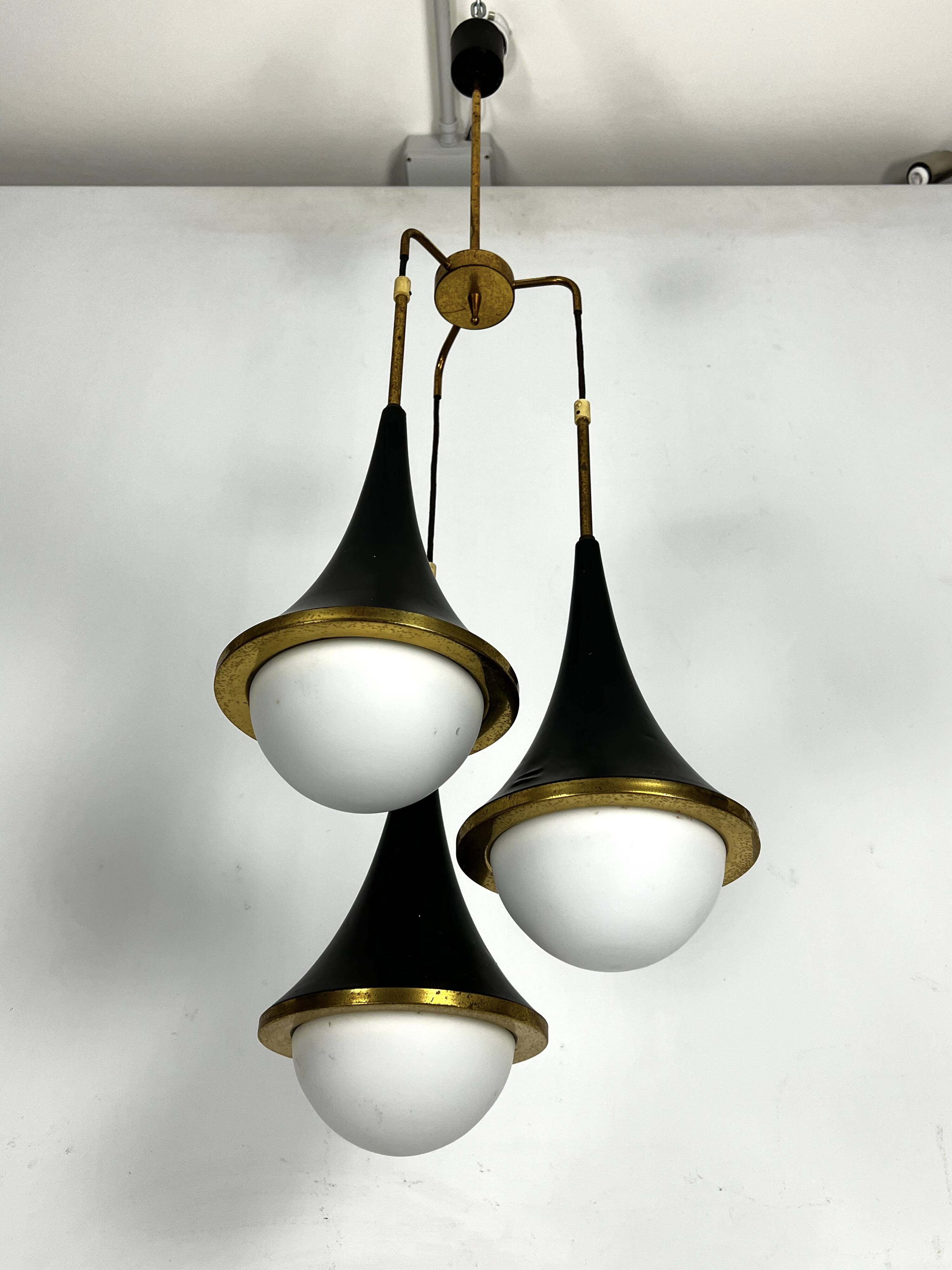 Mis-Century Stilnovo style pendant with three lights. Italy 1950s