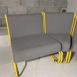 Yellow tubular modular bench & gray fabric
