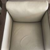 Two armchairs and an Art Deco style pouf