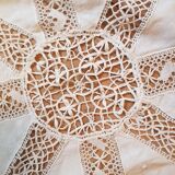Round hand-embroidered linen tablecloth