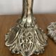Pair of pressed glass candlesticks with silver plating.