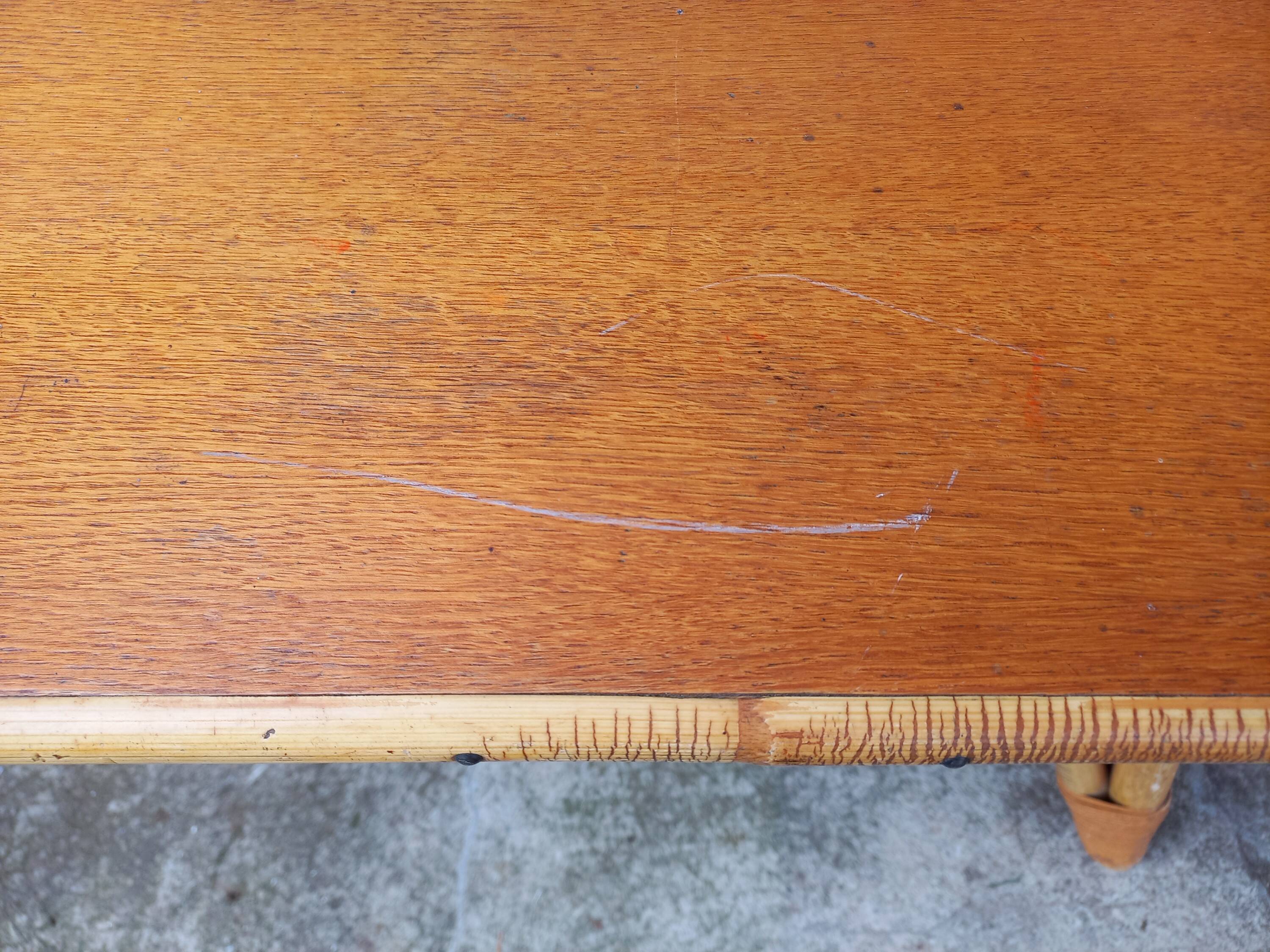 Rattan coffee table with compass legs