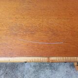 Rattan coffee table with compass legs