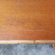 Rattan coffee table with compass legs