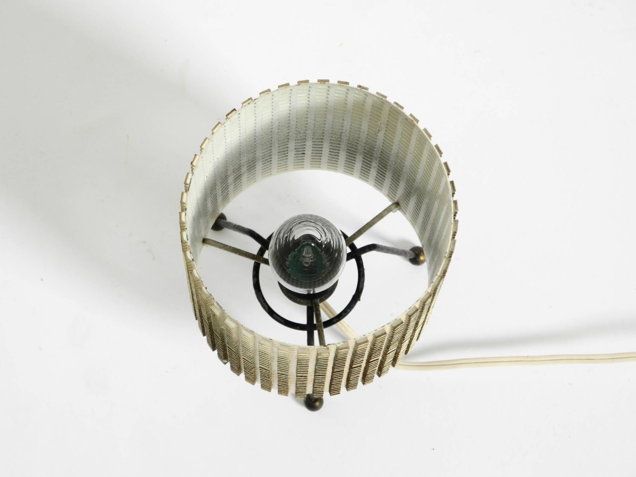 Original 1950s brass tripod table lamp with a perforated metal lampshade