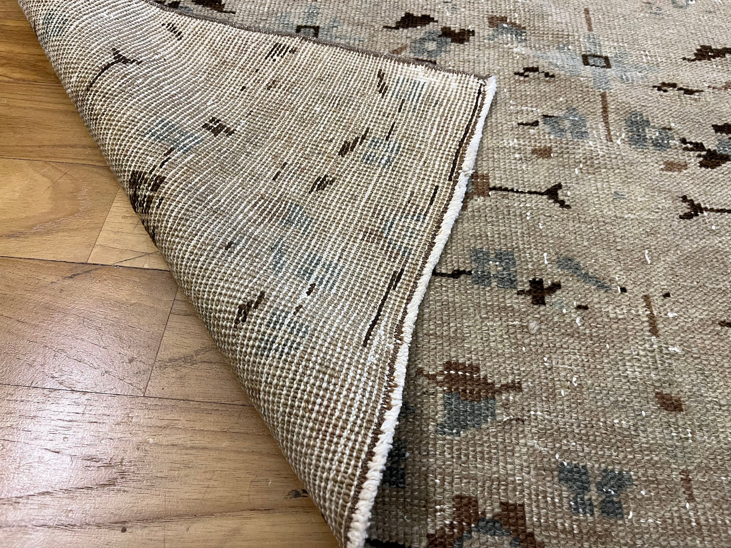 Unique aztec design muted handmade old rug