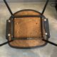1960 armchair in black faux leather in the style of Eero Saarinen, Knoll.