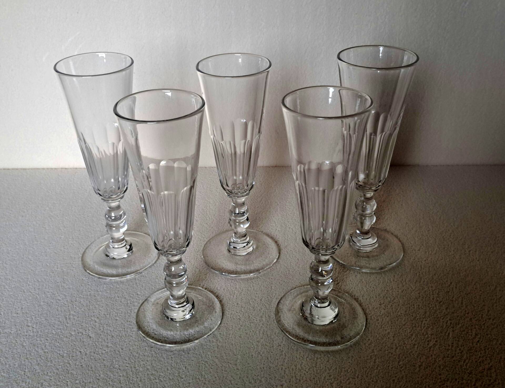 5 crystal Champagne flutes from Baccarat, Clermont model, 19th century.