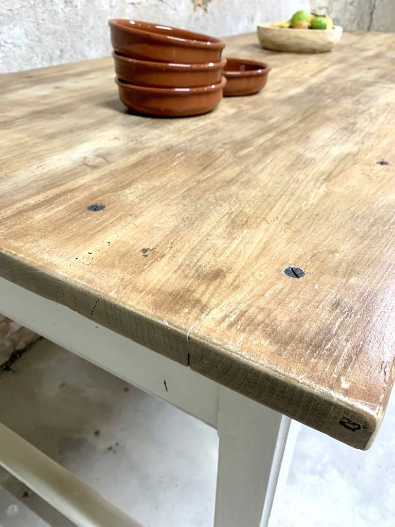 Farm table with off-white legs.