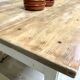 Farm table with off-white legs.